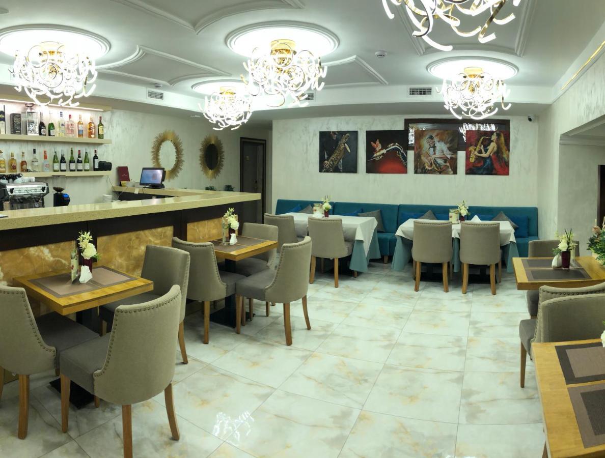 Grace Point Hotel Astana Værelse billede