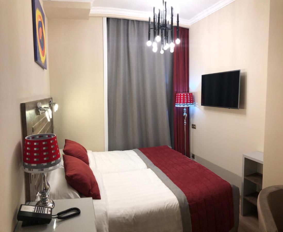 Grace Point Hotel Astana Værelse billede