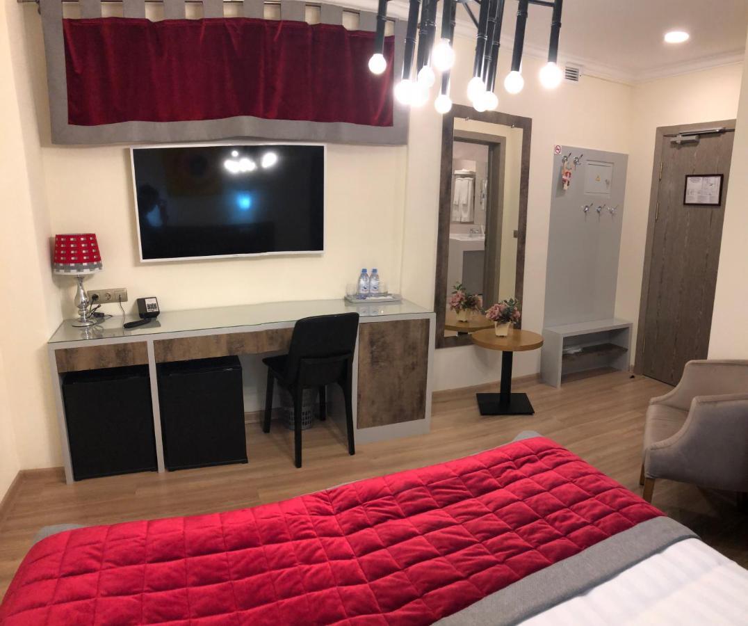 Grace Point Hotel Astana Værelse billede