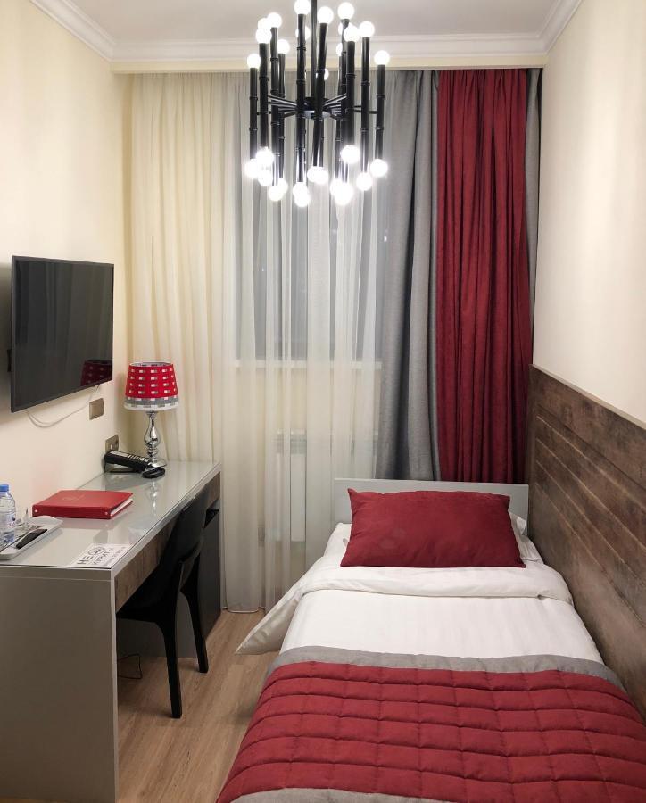 Grace Point Hotel Astana Værelse billede