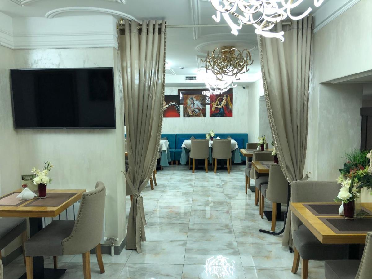 Grace Point Hotel Astana Værelse billede