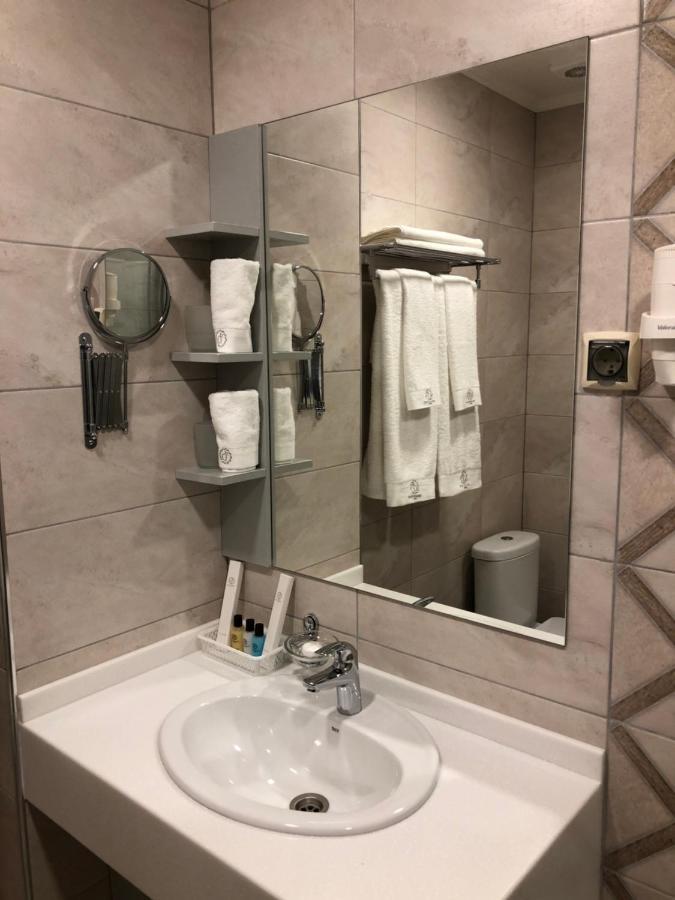 Grace Point Hotel Astana Værelse billede